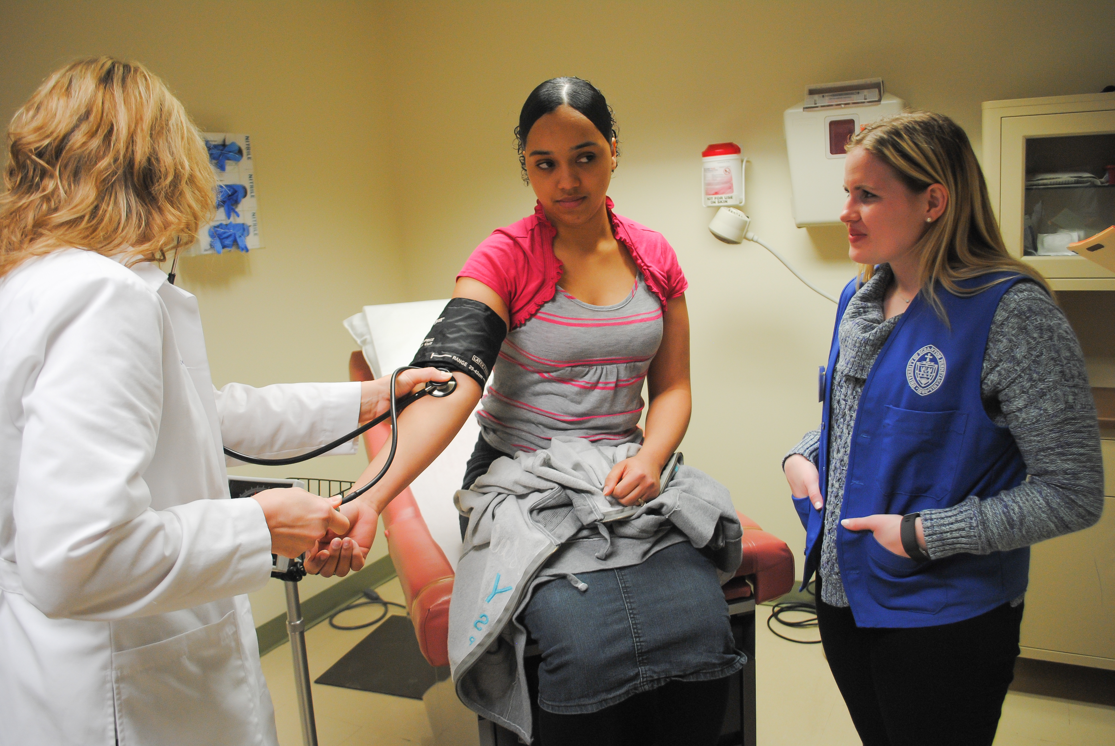 Patient with doctor in exam room.jpg